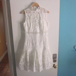 Reveuse Sleeveless Ivory Lace/Crochet dress. NWT. Size; S. Asking:$85.